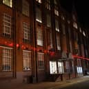 The Symington Building with red lights supports the poppy appeal.
PICTURE: ANDREW CARPENTER