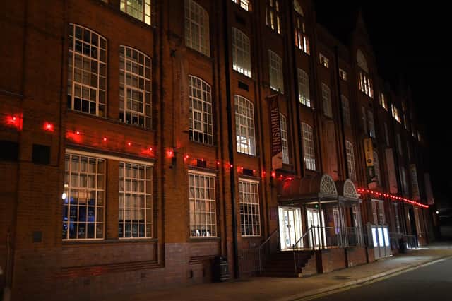 The Symington Building with red lights supports the poppy appeal.PICTURE: ANDREW CARPENTER
