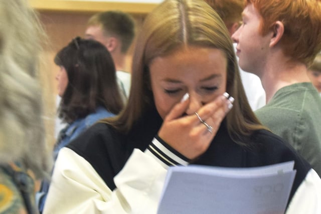 Students at Lutterworth High School celebrate their excellent results.