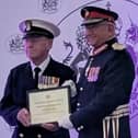 PO Michael Petch and Michael Kapur OBE CStJ. Picture: Paul Claxton