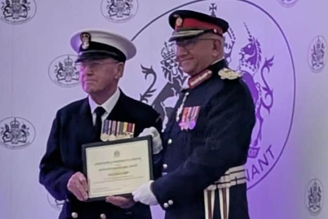 PO Michael Petch and Michael Kapur OBE CStJ. Picture: Paul Claxton