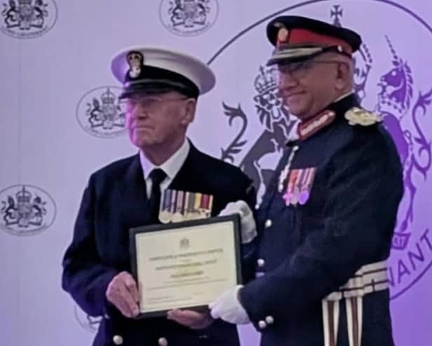 PO Michael Petch and Michael Kapur OBE CStJ. Picture: Paul Claxton