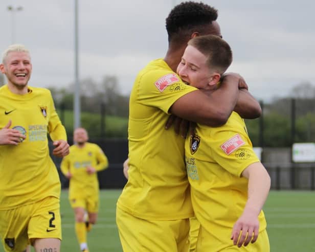 Luca Miller is congratulated after scoring his goal in Saturday's 5-0 win over AFC Quorn (Picture: Phil Passingham)