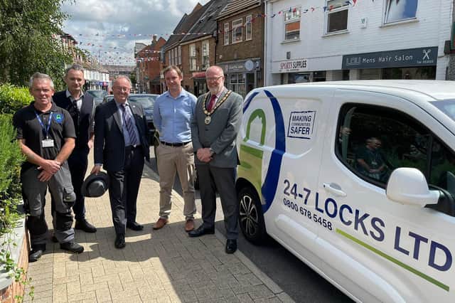 A new security scheme to help protect 436 homes in Lutterworth from burglars has been hailed by Leicestershire Police and Crime Commissioner Rupert Matthews (centre).
