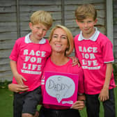 Rebecca Dixon from Market Harborough is doing this year's Race For Life at Stoneleigh in memory of her husband James who dies of kidney cancer in 2019. She is pictured with her sons Brody, 7, and Blake, 5. (Will Johnston Photography).