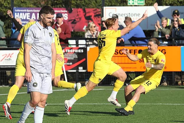 Brady Hickey runs away to celebrate his dramatic last-gasp winner for Harborough against Worksop Town on Saturday (Picture: Phil Passingham)
