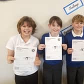 Stanley, Fred, Jack and Ben with their bonus papers