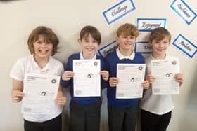 Stanley, Fred, Jack and Ben with their bonus papers