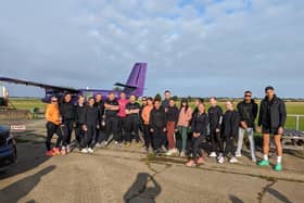 Dean pictured (far right) alongside some of his bootcampers before taking on the Skydive bootcamp.