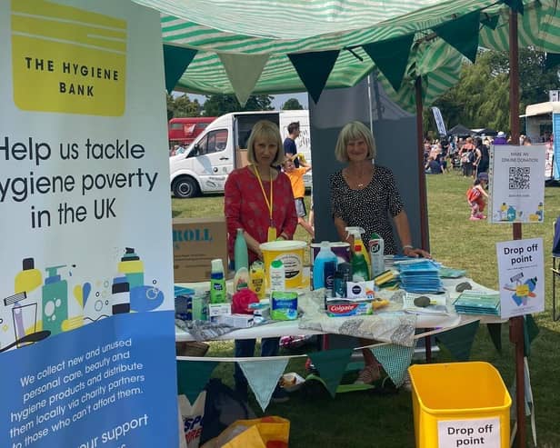 Volunteers collect donations for the hygiene bank