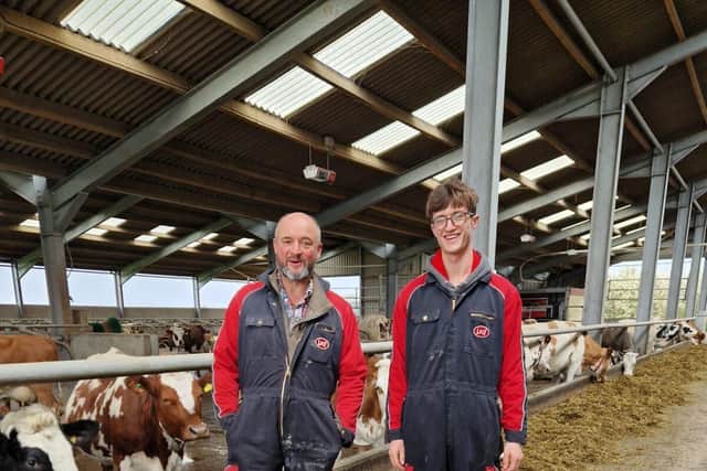 Marcus and Sam Hunt with their milking herd of cows