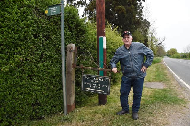 Bill Bonnamy, 70, has flown 4,000 miles to come to the town as he strives to find out a lot more about his father’s old division, the crack 82nd Airborne. Outside the sign for Papillon Hall in Lubenham.
PICTURE: ANDREW CARPENTER