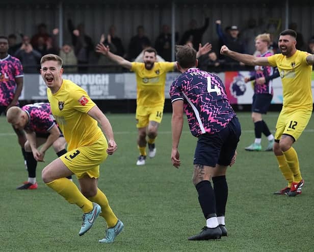 A delighted Josh Walsh gets ready to celebrate after firing Harborough Town into a 2-0 lead against Peterborough Sports (Picture: Phil Passingham)