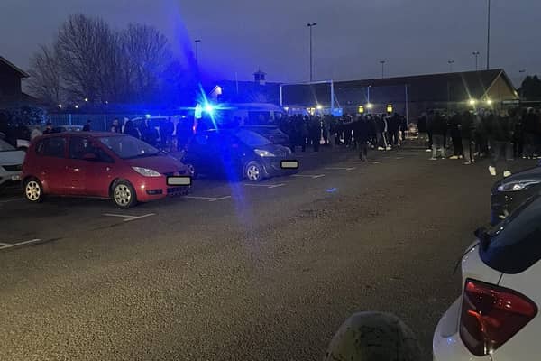 Police dealing with an incident in the car park after the game