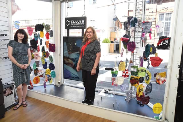 Lynn Carson and Julie Hinchy from Davis Optometrists supporting the Art Windows with work by artist Penny Andrewz.
PICTURE: ANDREW CARPENTER
