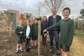 Digging in - MP Neil O'Brien with Meadowdale Primary School pupils