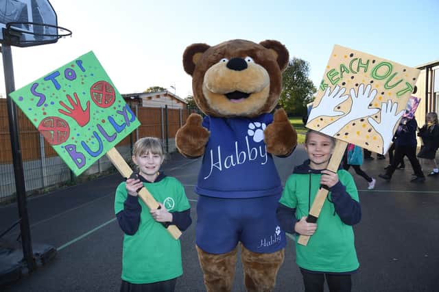 Rosie LeBoutillier and Lewis Burrows during the anti bullying protest with Habby Bear at Farndon Fields Primary School.