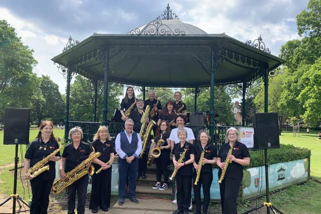 Phoenix Saxophone Orchestra with Tom Bruton, owner of their sponsor Saxtet Publications