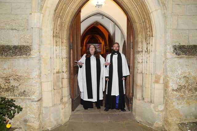 New team vicars Rev'd Vicki and Phil Bryson open the frnt doors at St Dionysius at the end of the licensed service by Bishop Saju.
PICTURE: ANDREW CARPENTER