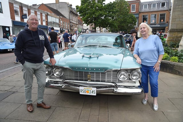 Dusty Miller and Jocelyn Miller with their 1960 Plymouth Belvedere.
