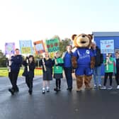Centre, Marie Connor, Habby Bear and Nick Simpkin during the anti bullying protest at Farndon Fields Primary School.