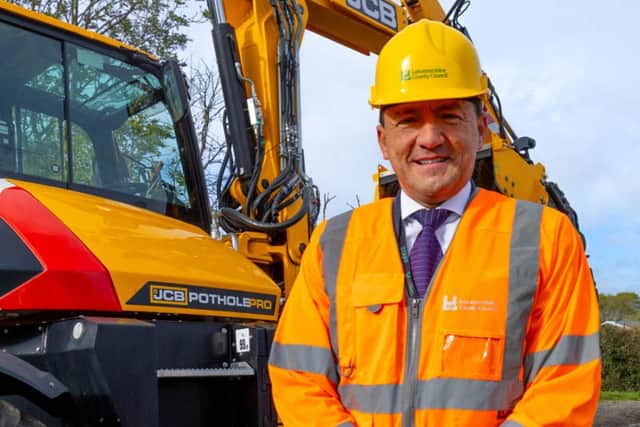 Councillor Hamilton-Gray with Pothole Pro. Picture: Leicestershire County Council