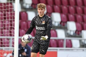 Harborough Town have signed teenage Northampton Town goalkeeper James Dadge on a work experience deal