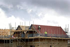 A plan has been launched to build more than 50 homes on land next to a Harborough district village primary school.