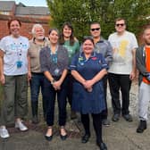 Jill's family with volunteers inside the garden. Picture: LEICESTERSHIRE PARTNERSHIP NHS TRUST