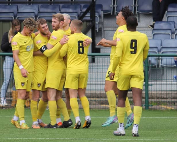 Harborough Town’s players celebrate Connor Kennedy’s match-winning goal at Sutton Coldfield on Saturday (Picture: Phil Passingham)​