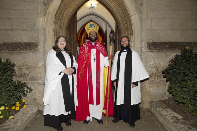 Bishop of Loughborough Saju Muthalay welcomes the new team vicars Rev'ds Vicki and Phil Bryson after the service.
PICTURE: ANDREW CARPENTER