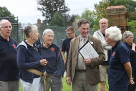 Britain in Bloom judges meet volunteers during their visit to Market Harborough.