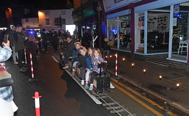 All aboard during the Christmas lights switch on.