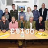 Blaston Show president Andrew Bishop (centre) and director William Young (far left) with charity recipients.