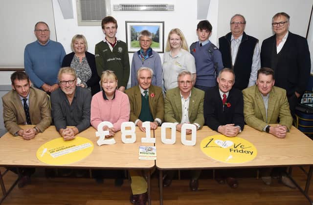 Blaston Show president Andrew Bishop (centre) and director William Young (far left) with charity recipients.