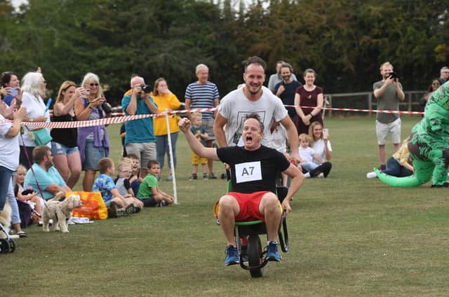 Action during the Great Glen adult wheel barrow race for Loros.
PICTURE: ANDREW CARPENTER