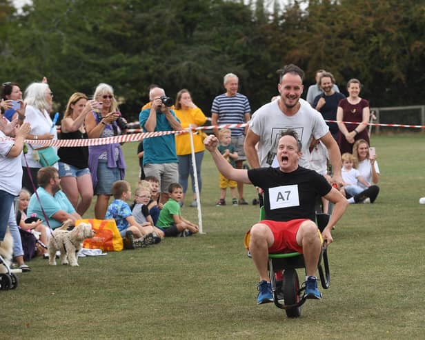Action during the Great Glen adult wheel barrow race for Loros.PICTURE: ANDREW CARPENTER