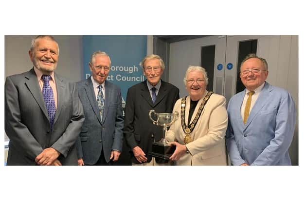 HDC chair Barbara Johnson presents the Cup to: (l to r) Peter Mitchell, Colin Sullivan, Peter Wilford, and Ralph Holderness.