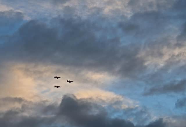 The Royal Air Force’s iconic aerobatics team were caught on camera by Mike Lee, over the village of East Farndon at just after 9pm as darkness began to fall.
