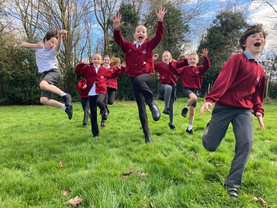 Children return to school with a spring in their step