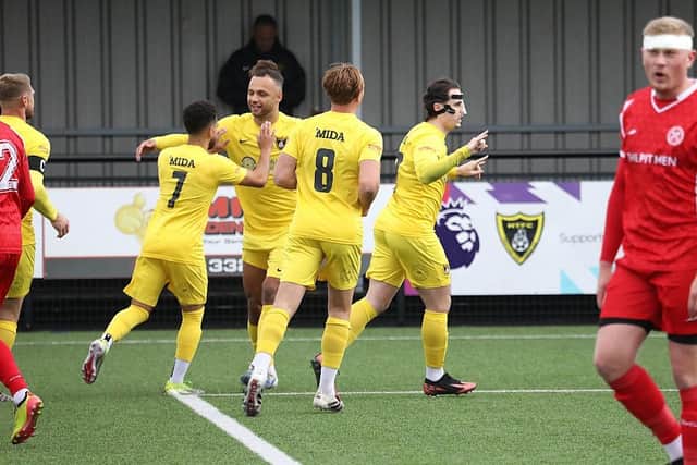 Ben Stephens runs away to celebrate after scoring Harborough Town's first goal in their 2-0 win FA Trophy over Hednesford (Picture: Phil Passingham)