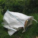 This old fridge packed with stinking frozen food has been dumped in beautiful countryside near Market Harborough.