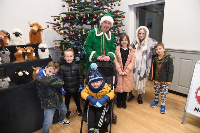 Children meet the Elf at the Wycliffe Rooms.