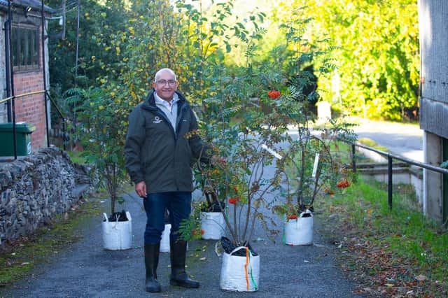 Lord-Lt of Leicestershire, Mike Kapur OBE, with the five trees