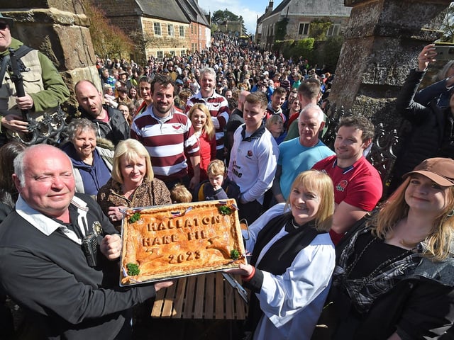 Phil Allen and Rev Jayne Lewis hold up the Hare Pie.