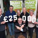 Front, President John Gilding with Market Harborough Macmillan Cancer Research Committee