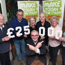 Front, President John Gilding with Market Harborough Macmillan Cancer Research Committee