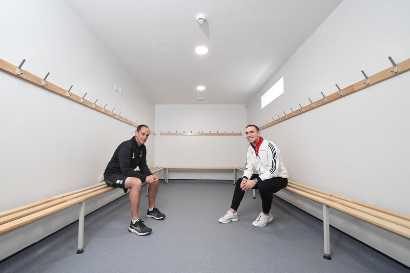PE teacher and Andrew Stamp inside the changing rooms.
