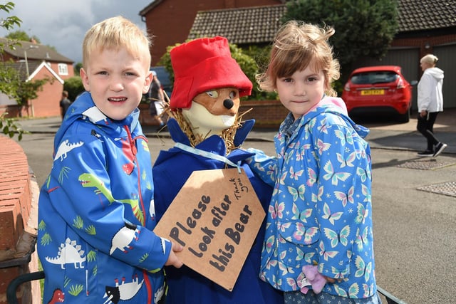 Charlie and Poppy Lee both aged four make friends with Paddington Bear.
