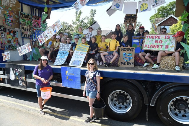Farndon Fields Primary School's raise climate change awareness with their carnival float.